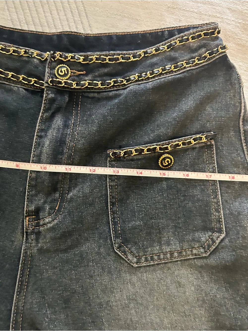 CHANEL Dark Blue Denim Jeans with Gold Chain Trim